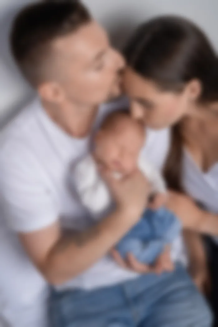 Newborn with stuffed animal in Radolfzell