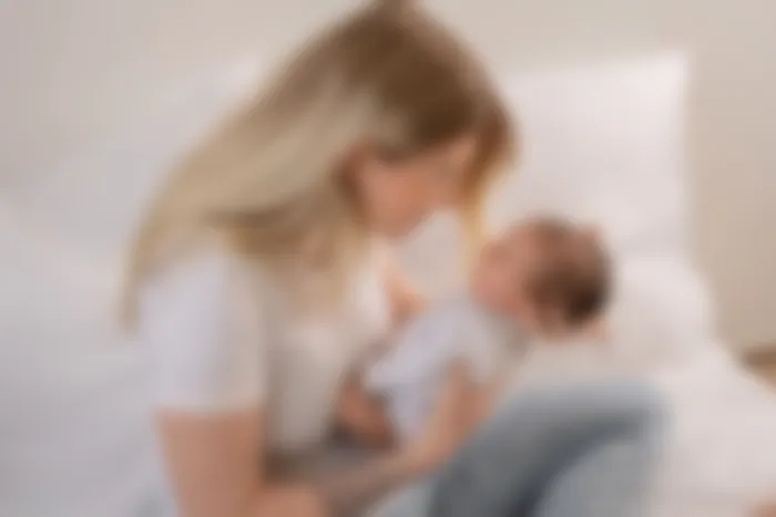 Newborn with children's book in Winterthur